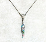 collier plume
